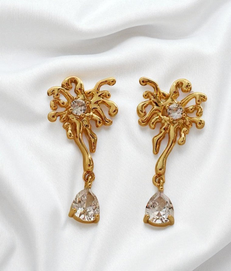 Serie Brillante Años Luz | Pendientes de lujo con circonitas de cobre de 18 quilates y diseño de fuegos artificiales Éclat de Feu