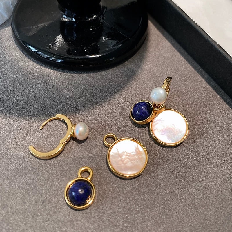 Pendientes de diseño de lujo con perlas de agua dulce francesas de nácar.