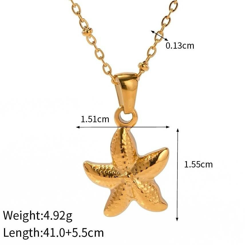 Collar estilo resort oceánico con perla, estrella de mar, caracola y caballito de mar