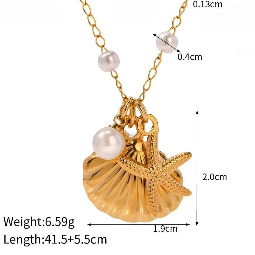 Collar estilo resort oceánico con perla, estrella de mar, caracola y caballito de mar