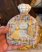 Bolsa de joyería con frasco de perfume francés Poesía de la Luz