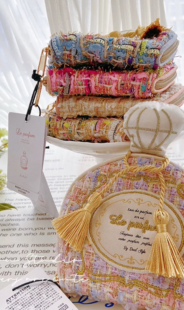 Bolsa de joyería con frasco de perfume francés Poesía de la Luz